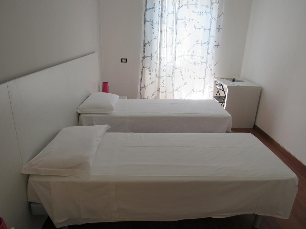 Tweepersoonskamer met 1 of 2 Bedden en Gedeelde Badkamer