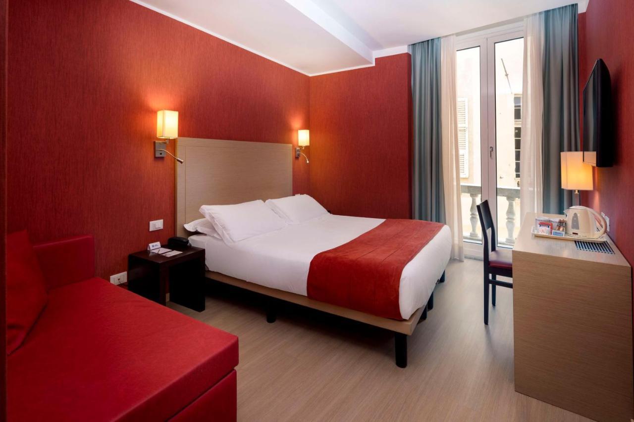 Quarto King Deluxe com Sofá-cama