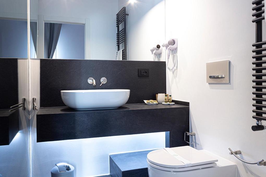 Deluxe Tweepersoonskamer met 1 of 2 Bedden en Eigen Badkamer