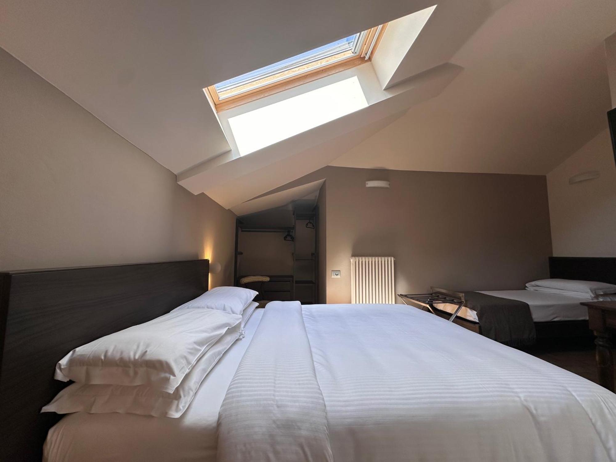 Chambre Triple avec Balcon