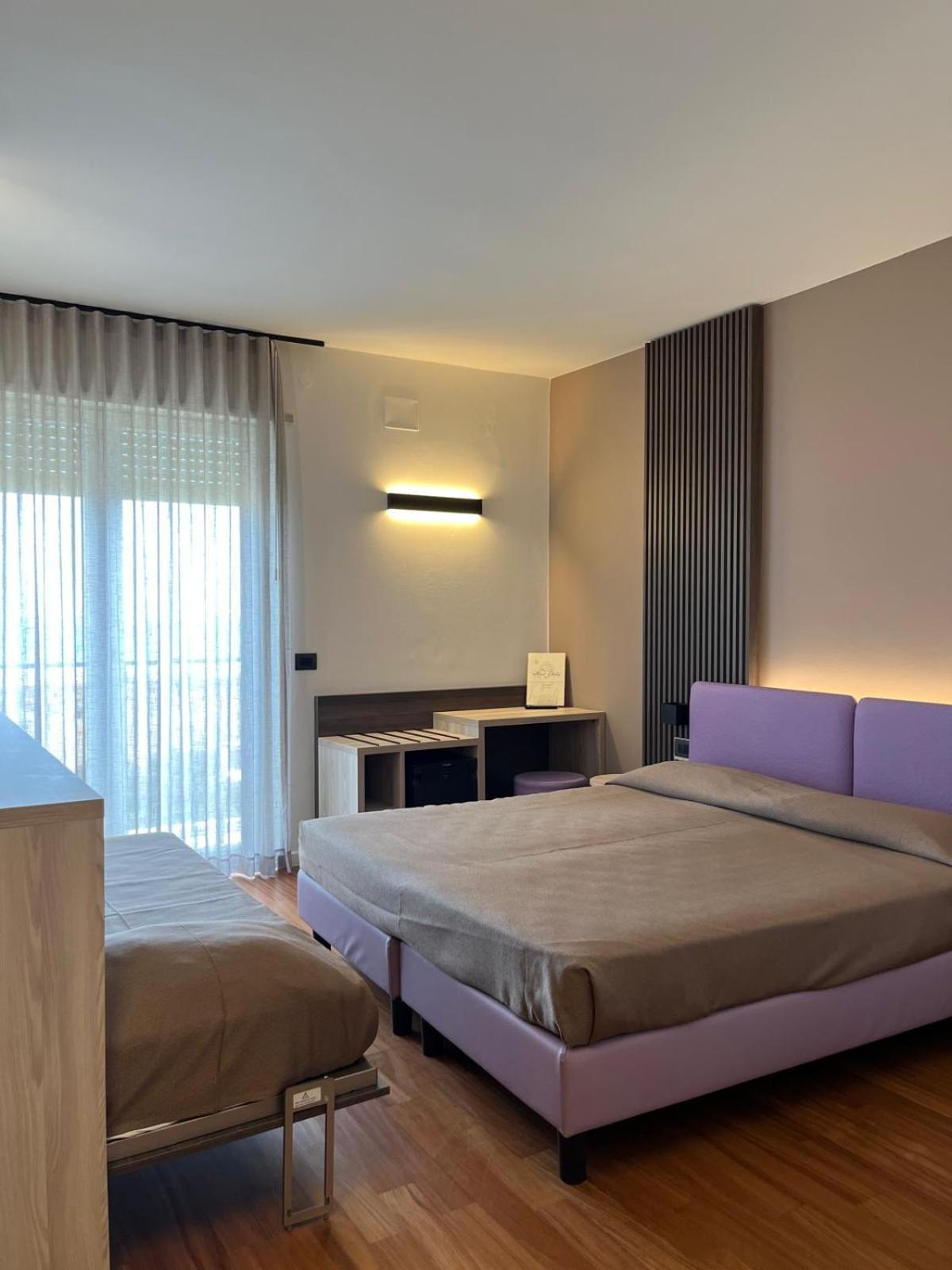 Dreibettzimmer mit Meerblick