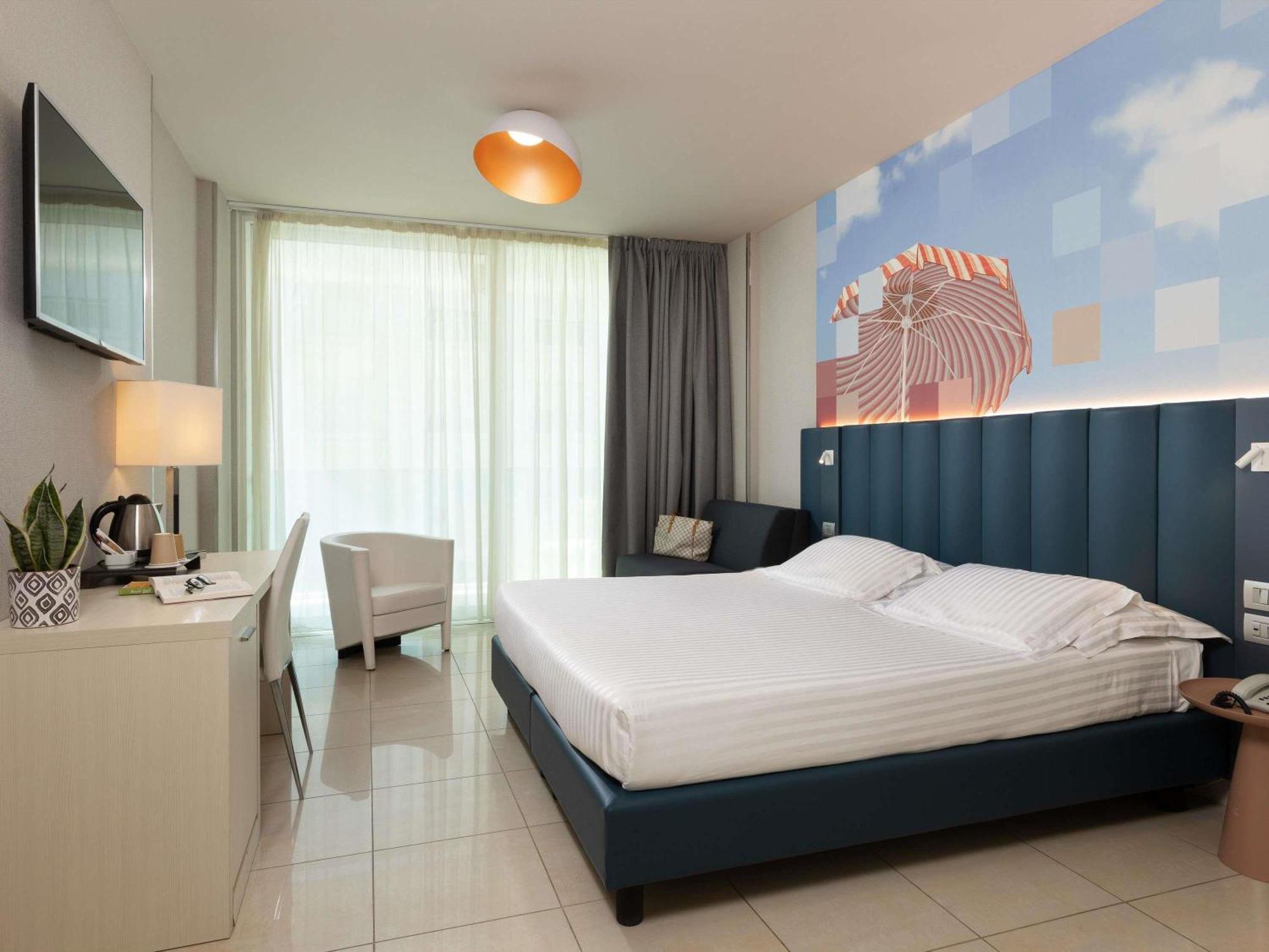 Superior Tweepersoonskamer met 2 Aparte Bedden en Balkon - Zijdelings Uitzicht op Zee