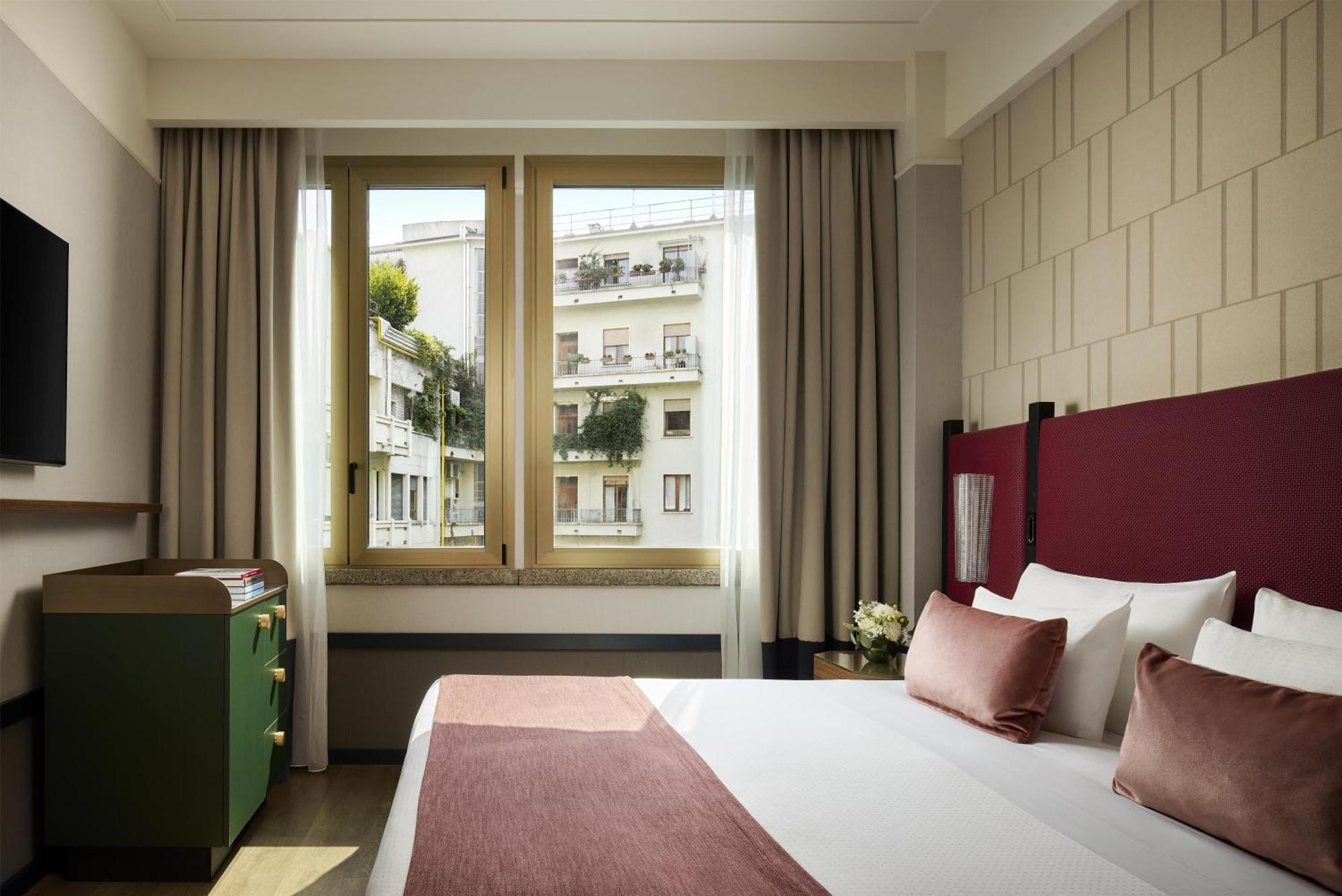 Quarto Premium com Cama de Casal ou 2 de Solteiro