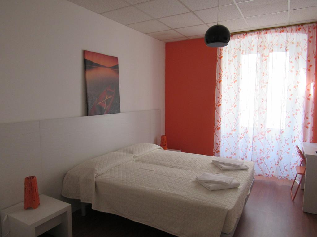 Tweepersoonskamer met 1 of 2 Bedden en Gedeelde Badkamer