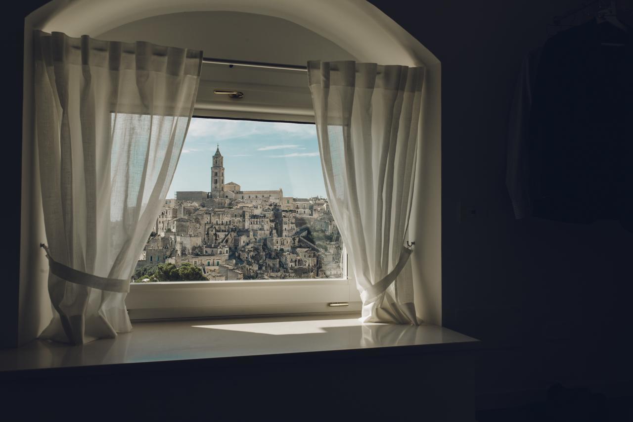 Camera Tripla con Vista Città