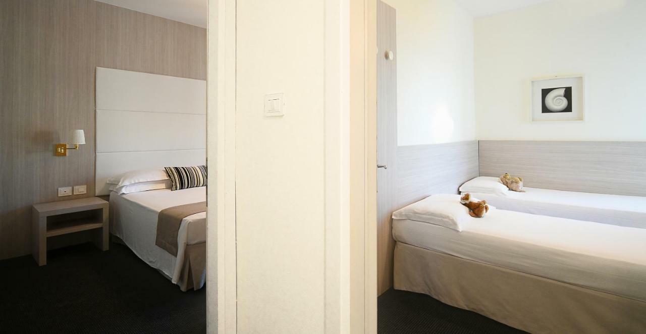 Two Connecting Rooms with Partial Sea View (2 Adults + 2 Children)