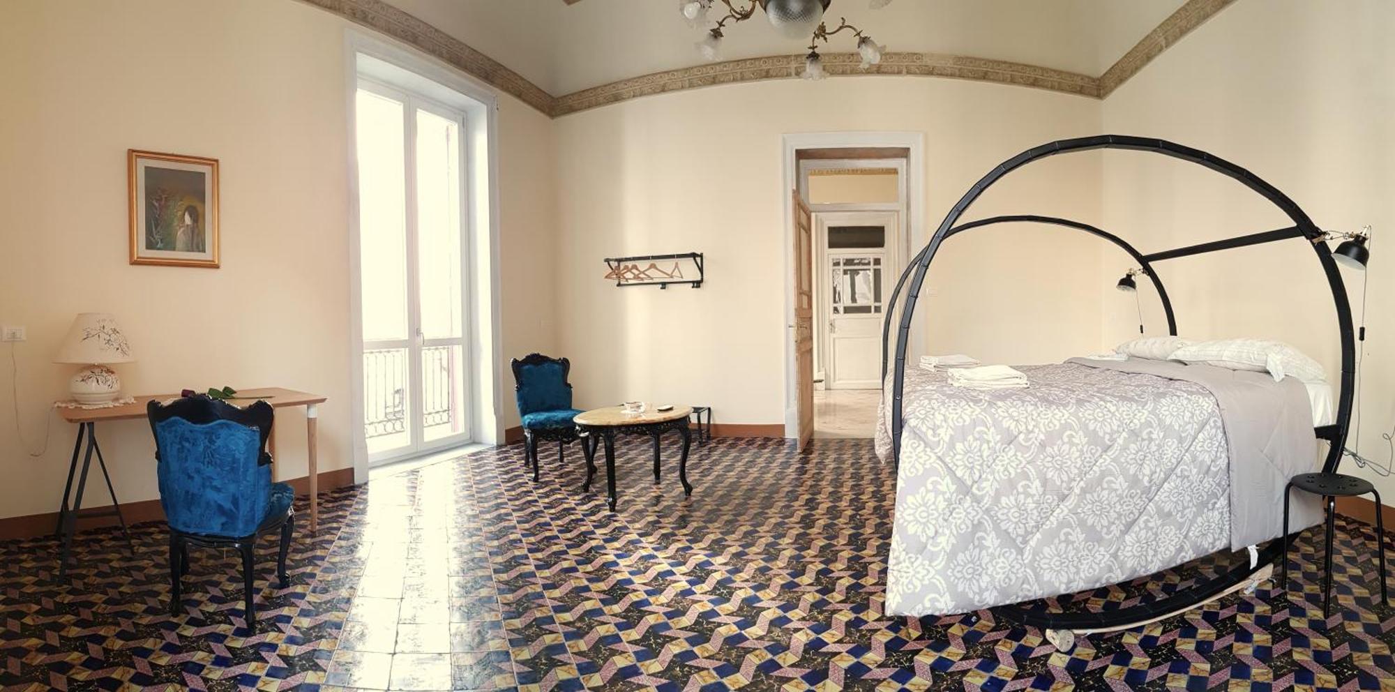 Zimmer mit Queensize-Bett